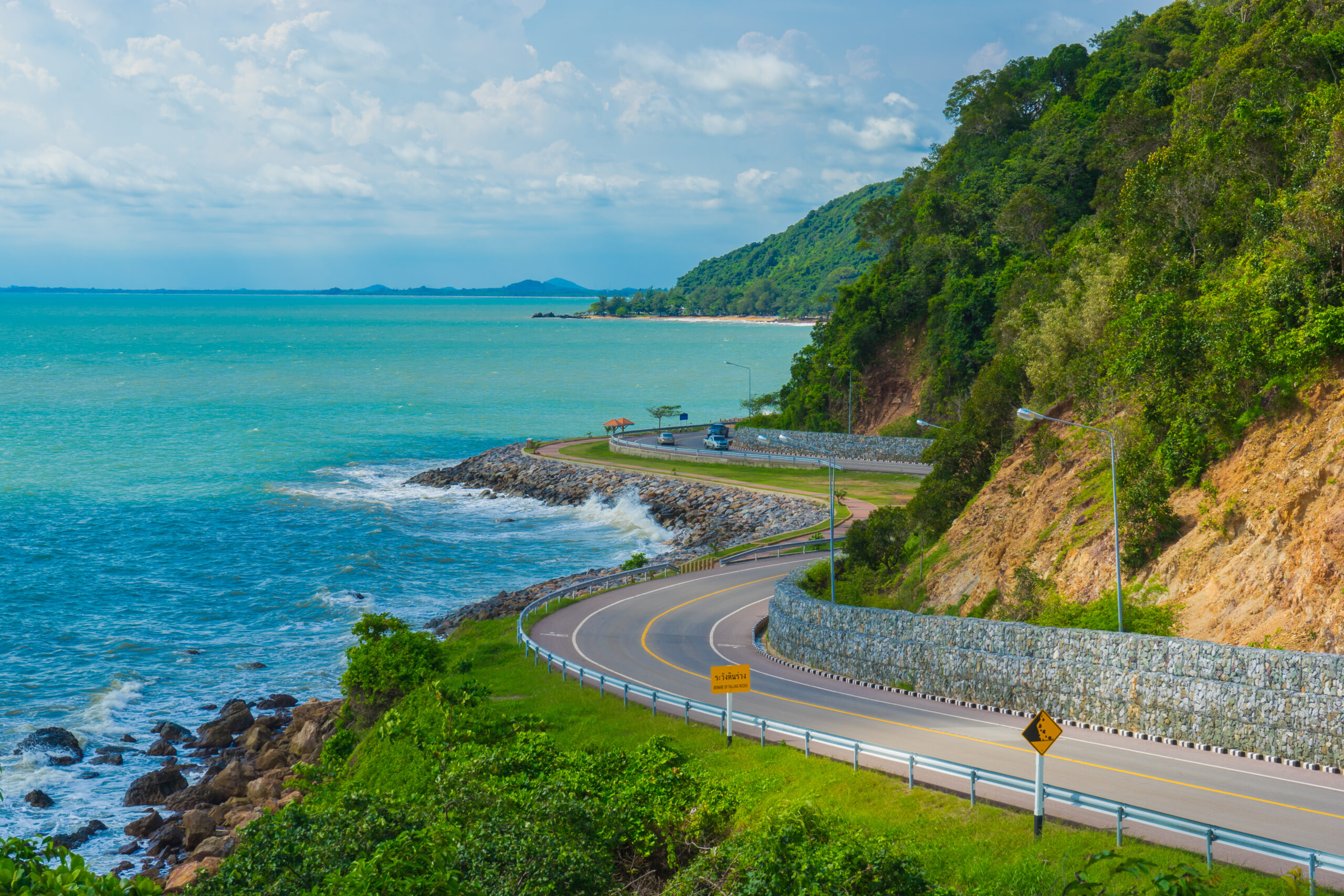 Beatiful,Curve,Road,And,Sea,With,Blue,Sky,And,Clouds