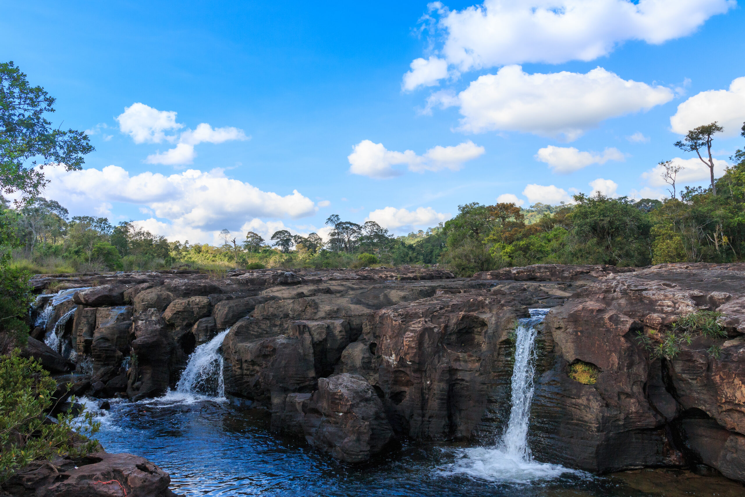 Jungle,Landscape,With,Flowing,Turquoise,Water,Of,Tad,Yao,Waterfalls